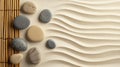 Zen Simplicity: A bamboo-inspired frame with smooth river stones on a Royalty Free Stock Photo
