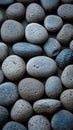 Zen simplicity rounded grey river rocks close up with natural balance