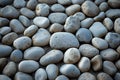 Zen simplicity rounded grey river rocks close up with natural balance