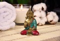 Zen spa still life with a buddha statue, towels and candle stock photo images