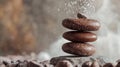 Zen stack of chocolate stones with sprinkled coconut flakes Royalty Free Stock Photo