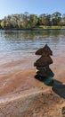 Zen stacked stones in a lake shore Royalty Free Stock Photo