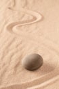 Zen stone Japanese meditation sand garden for focus and concentration on balance and spirituality Royalty Free Stock Photo