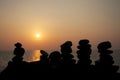 Zen stones on a background of sunset over sea Royalty Free Stock Photo