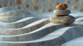 Zen stones balance on patterned sand Royalty Free Stock Photo