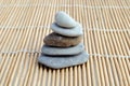 Zen stones on bamboo background