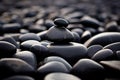 Zen stones on the beach, closeup of black pebbles. Generative AI. Royalty Free Stock Photo