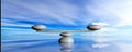 Zen stones on a blue sky and sea background. 3d illustration Royalty Free Stock Photo