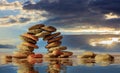 Zen stones bridge stack on cloudy sky and sea background