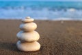 Zen stones. Concept of harmony, stability, life balance, relaxation and meditation. Pyramid of stones on the seashore. Copy space Royalty Free Stock Photo