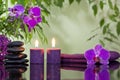 Zen stones orchid and aromatic candles Royalty Free Stock Photo