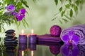 Zen stones orchid and aromatic candles Royalty Free Stock Photo