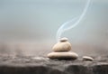 Zen stones with smoke Royalty Free Stock Photo