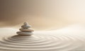 Zen stones stack on raked sand in a minimalist setting for balance and harmony Royalty Free Stock Photo