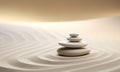 Zen stones stack on raked sand in a minimalist setting for balance and harmony Royalty Free Stock Photo