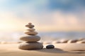 Zen stones stack on sand waves in a minimalist setting for balance and harmony Royalty Free Stock Photo