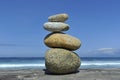 Zen stones stacked at beach copy space Royalty Free Stock Photo