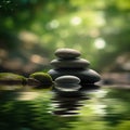 Zen stones stacked in a green blurry background