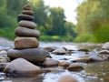 Zen stones stacked by a tranquil river