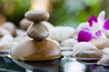 Zen Stones stacked with water reflection