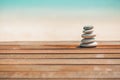 Balanced several Zen stones on blurred beautiful the beach background Royalty Free Stock Photo