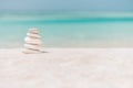 Balanced several Zen stones on blurred beautiful the beach background Royalty Free Stock Photo