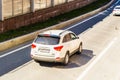 Zenith view of a Hyundai IX55 SUV car racing on highway road