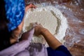 Zenithal shot of woman making cake.