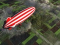 Zeppelin flying over farmland