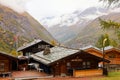 Zermatt, Switzerland-October 21, 2019:View of The Old Building on Furi cable car station in autumn and rainny day. at furi village Royalty Free Stock Photo