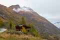 Zermatt, Switzerland-October 21, 2019:View of The Old Building on Furi cable car station in autumn and rainny day. at furi village Royalty Free Stock Photo