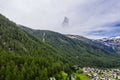 Zermatt Valley and Matterhorn Peak under cloudy sky, Switzerland Royalty Free Stock Photo