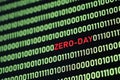 ZERO-DAY text and binary code concept from the desktop computer screen. Royalty Free Stock Photo