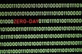 ZERO-DAY text and binary code concept from the desktop computer screen. Royalty Free Stock Photo