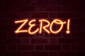 Zero neon sign on brick wall background. Fluorescent Neon tube Sign on brickwork Business concept for Zero Zeros Nought Tolerance