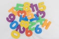 Zero to nine plastic number set on a white background in random order Royalty Free Stock Photo