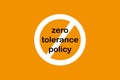 zero tolerance policy sign on yellow Royalty Free Stock Photo
