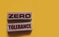 Zero tolerance - words from wooden blocks with letters, severely punishing all unacceptable behaviour, zero tolerance Royalty Free Stock Photo