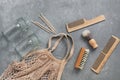 Zero waste. Bath and household accessories. Cotton bag, glass jar, wooden comb, wooden shaving brush, cuticle pusher, brush on a