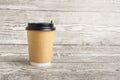 Zero waste coffee paper cup on the wooden background Royalty Free Stock Photo