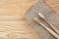 Zero waste concept. Bamboo toothbrush on wooden background. Plastic free essentials, teeth care. Royalty Free Stock Photo