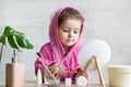 Zero waste concept. beautiful cute little girl brushing teeth, washing face in bathroom Royalty Free Stock Photo