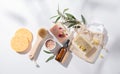 Zero waste concept beauty spa with natural cosmetic products: soap, sponges, oil and massage brushes, mineral salt on white
