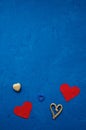 Zero waste concept. environmentally friendly different hearts wooden, straw, linen on a blue background. Congratulations