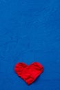 Zero waste concept. environmentally friendly flax heart on a blue background. Congratulations on Valentine`s Day, birthday or