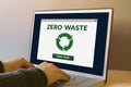 Zero waste concept on laptop computer screen on wooden table Royalty Free Stock Photo