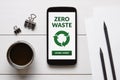 Zero waste concept on smart phone screen with office objects Royalty Free Stock Photo