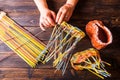 Top view of the process of weaving from paper