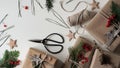 Zero waste and eco friendly christmas concept. Christmas and New Year gifts for family and friends wrapped in brown paper, rope