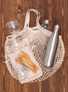 Zero waste eco friendly objects such as reusable linen shopping bags and glass jars Royalty Free Stock Photo